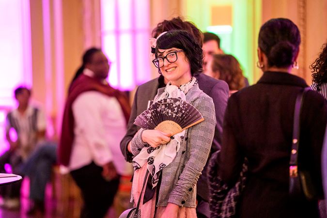 Closeup photo of a Underground event attendee smiling