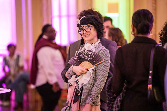 Closeup photo of a Underground event attendee smiling