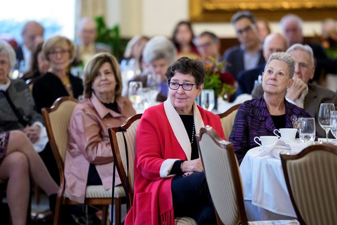 League member listens attentively