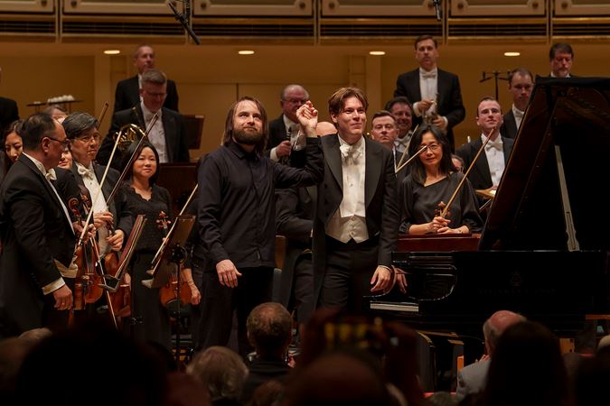 CSO Artist-in-Residence and pianist Daniil Trifonov and Zell Music Director Designate Klaus Mäkelä take a bow hand-in-hand