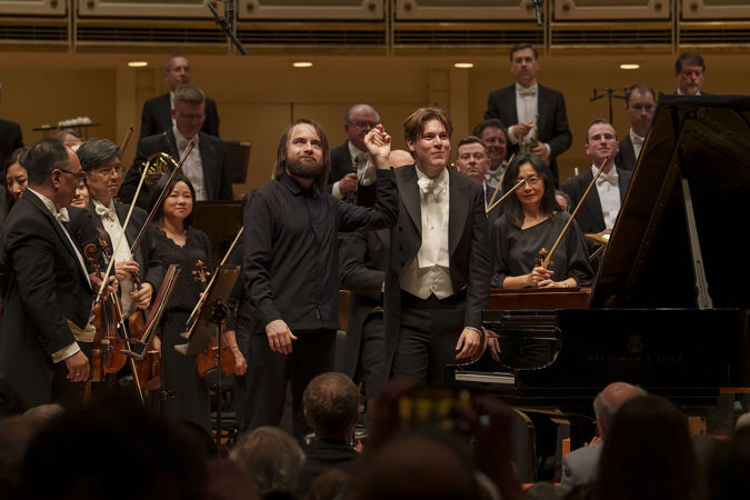 CSO Artist-in-Residence and pianist Daniil Trifonov and Zell Music Director Designate Klaus Mäkelä take a bow hand-in-hand