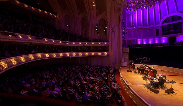 view from the right side of the box level as the audience gives its rapt attention to Eliane Elias and her quartet performing on stage