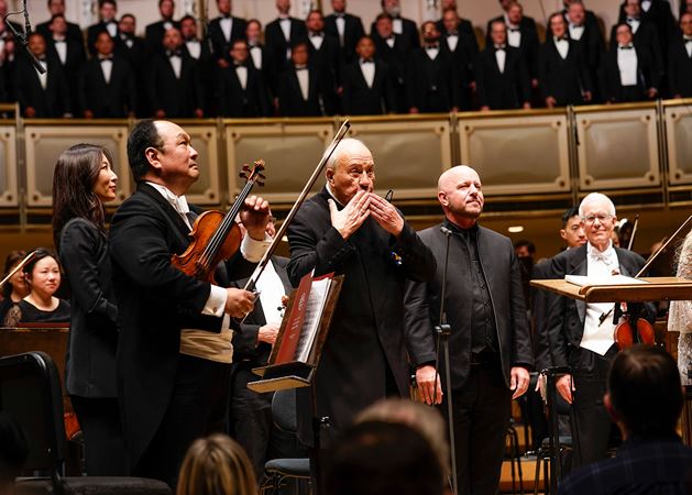 conductor acknowledging audience