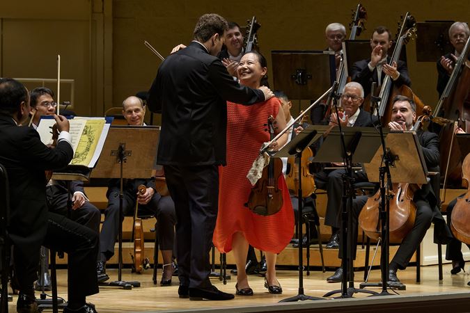 Teng Li and Nikolaj Szeps-Znaider embrace after their encore performance
