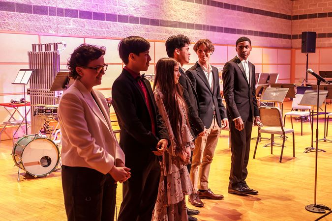 young composers standing