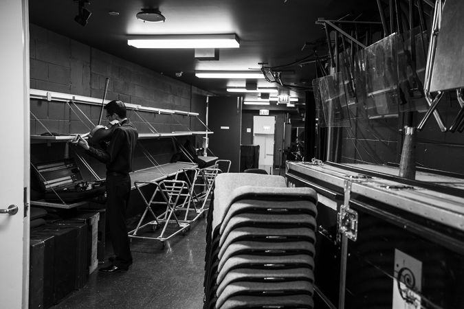 CSO viola Danny Lai warming up backstage