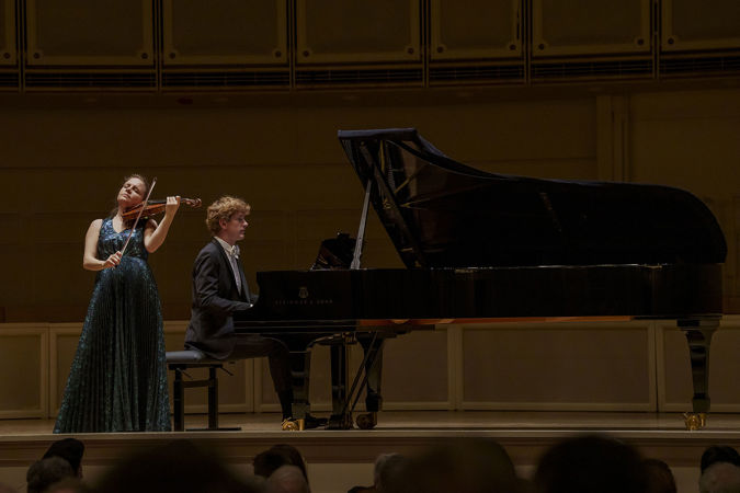 Violinist Julia Fischer and pianist Jan Lisiecki performing on stage