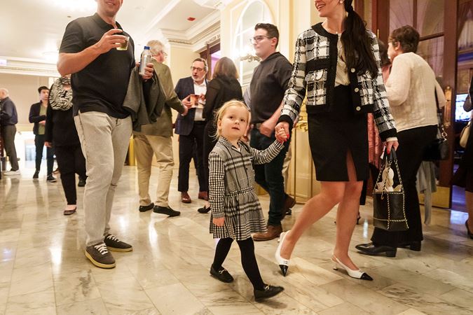 Audience members in lobby