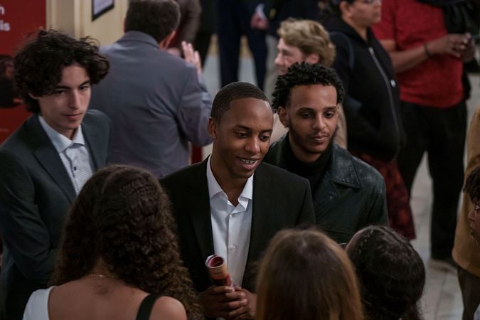 audience members in lobby