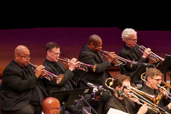 the trumpet section of the Chicago Jazz Orchestra performing
