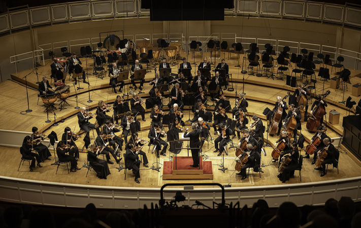 Wide shot of the CSO with Esa-Pekka Salonen on the podium