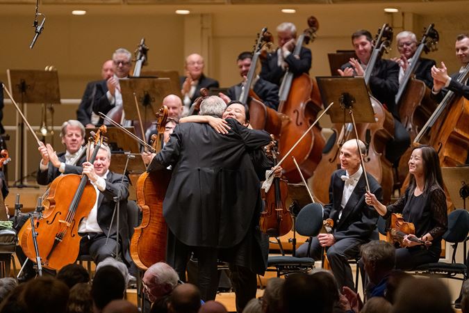 CSO soloists hugging