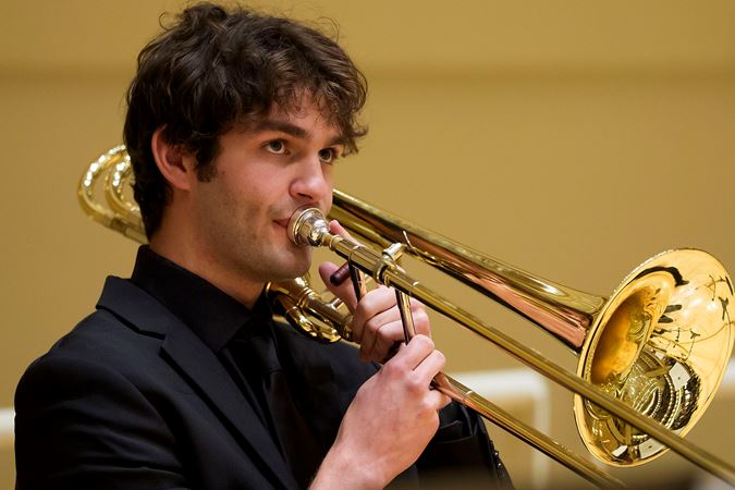 Closeup shot of a Civic trombonist warming up