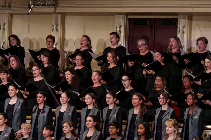 A group shot of sopranos and altos of the Chicago Symphony Chorus and the Uniting Voices Chicago choral ensemble