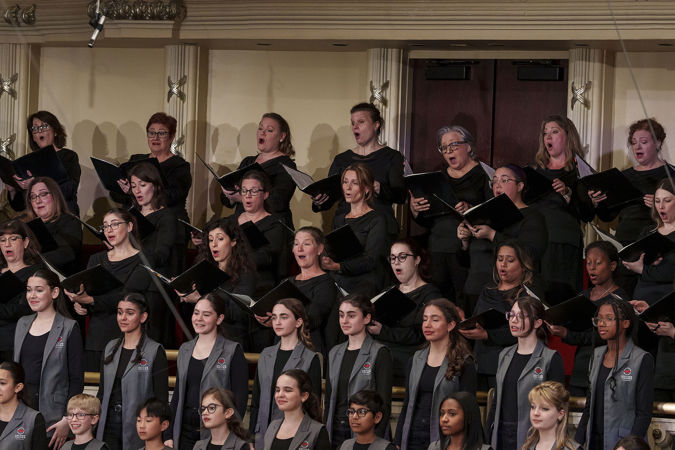 A group shot of sopranos and altos of the Chicago Symphony Chorus and the Uniting Voices Chicago choral ensemble