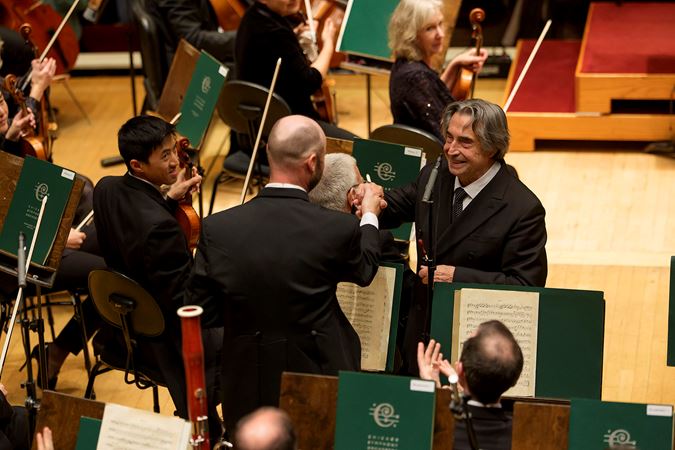 Riccardo Muti shakes hands with CSO English horn and oboe Scott Hostetler after an outstanding solo performance in Dvořák's Ninth Symphony