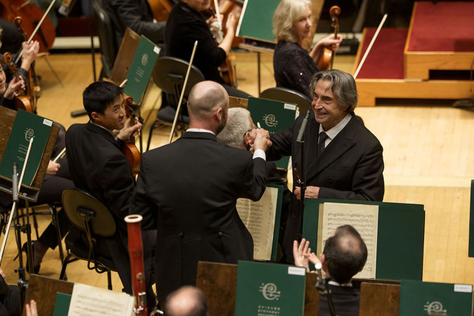 Riccardo Muti shakes hands with CSO English horn and oboe Scott Hostetler after an outstanding solo performance in Dvořák's Ninth Symphony