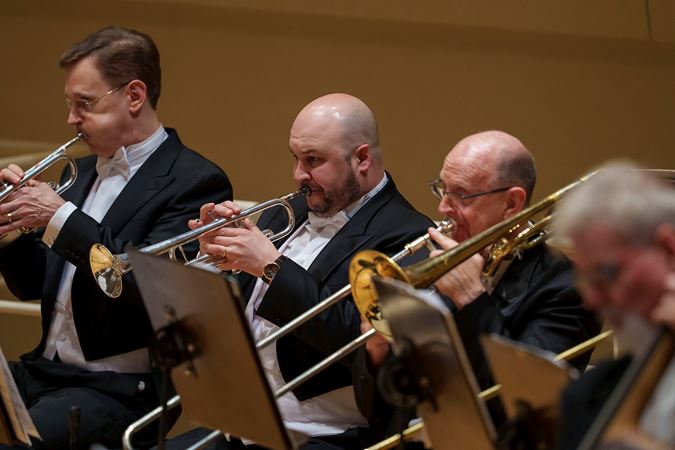 Group action shot of the CSO principal trumpet Esteban Batallán and trombone player Michael Mulcahy