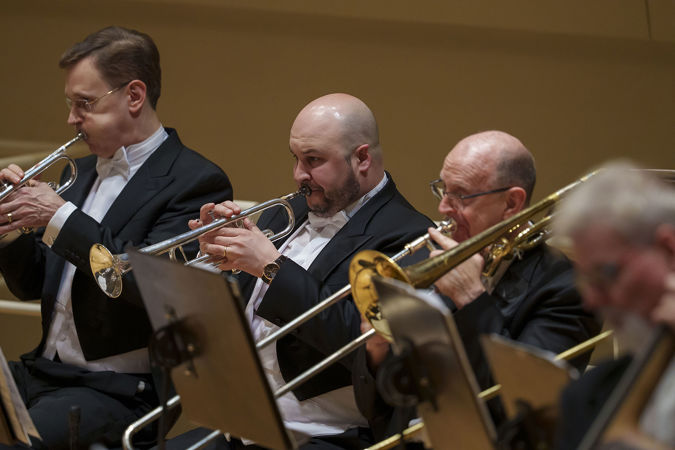 Group action shot of the CSO principal trumpet Esteban Batallán and trombone player Michael Mulcahy