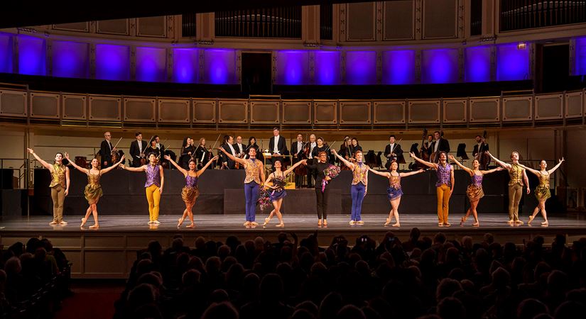 A bow shot of choreographer Amy Hall Garner and dancers on stage