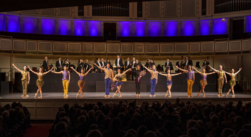 A bow shot of choreographer Amy Hall Garner and dancers on stage