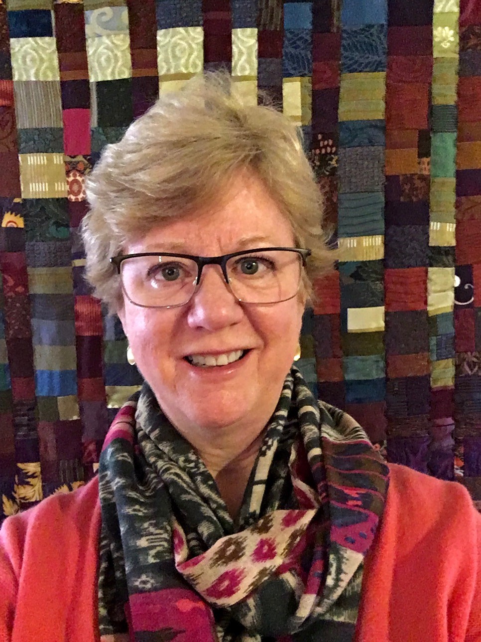 Kathy Nordmeyer, Patron Services associate, selects programs