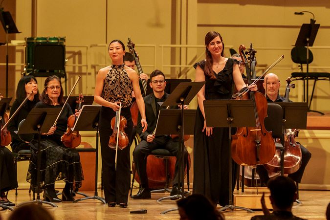 CSO associate concertmaster Stephanie Jeong and cello Karen Basrak take a joint bow after their solos