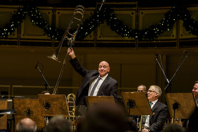 CSO trombone Charles Vernon raises his instrument in preparation for a bow