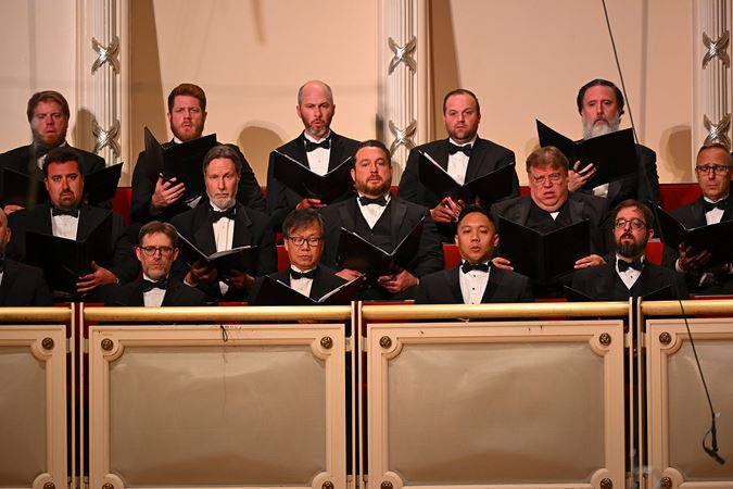 chorus members singing