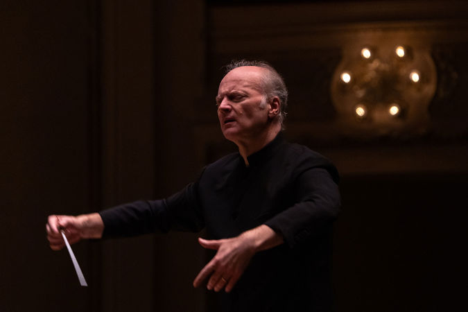 Closeup of Gianandrea Noseda on stage with the CSO