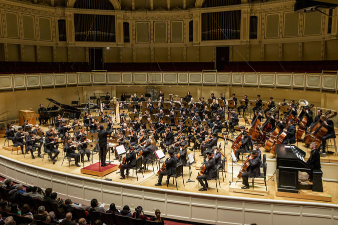 Wide Shot Of Conductor Thomas Wilkins And Civic On Stage