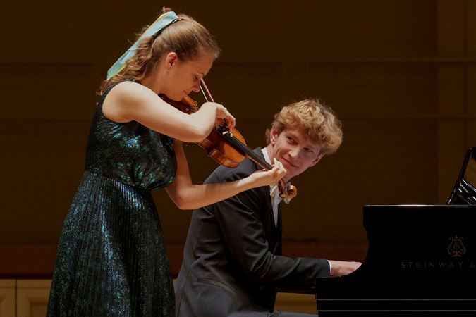 Closeup of pianist Jan Lisiecki and violinist Julia Fischer