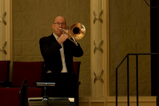 Closeup Shot Of CSO Trombone Michael Mulcahy Performing From The Terrace