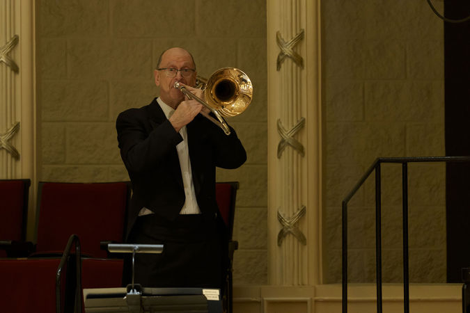 Closeup Shot Of CSO Trombone Michael Mulcahy Performing From The Terrace