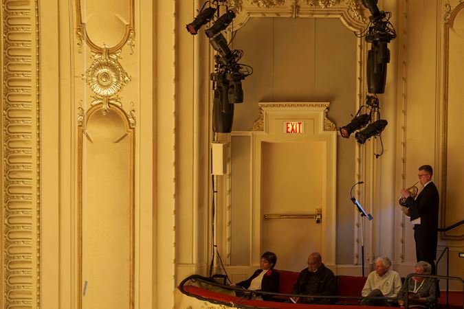 CSO principal horn Mark Almond performing on the lower balcony