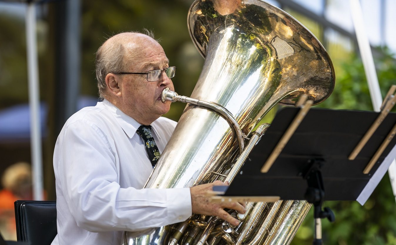 Principal Tuba Gene Pokorny performs at the Breakers retirement community on Aug.