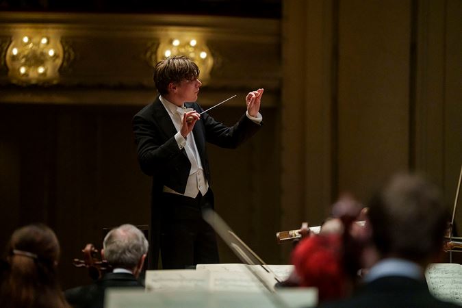 Closeup of Zell Music Director Designate Klaus Mäkelä leading the CSO in Mahler 3