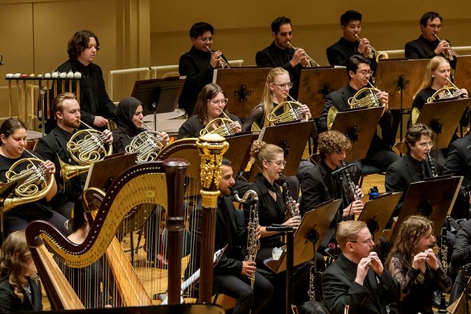 Group Shot Of Civic Horn Section On Stage