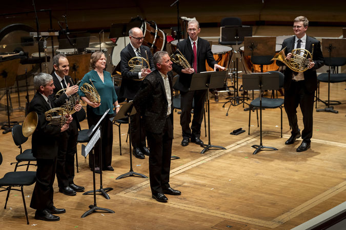 composer Steven Juliani is recognized on stage