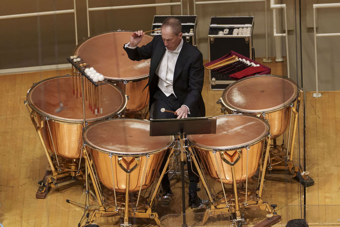 CSO principal timpani David Herbert prepares to strike a drum during the symphony's final movement
