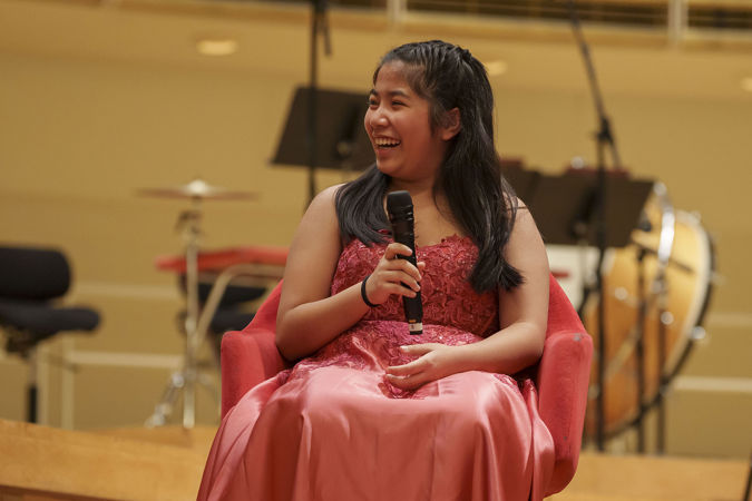 2025 Young Artists Competition finalist Evangeline Wang laughing during a postconcert Q&A session