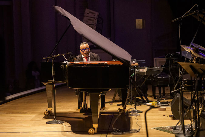 through the window between the piano keyboard and lid, Gonzalo Rubalcaba concentrates on the music