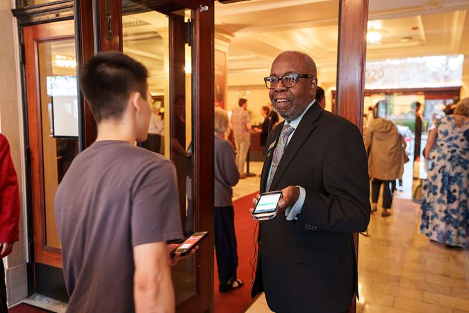 usher scanning ticket