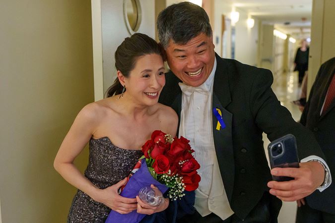 Yeh with flowers taking selfie