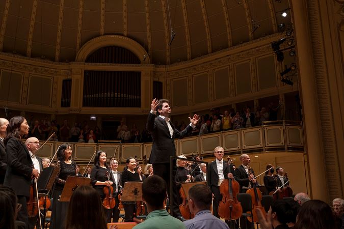 Shani accepting applause