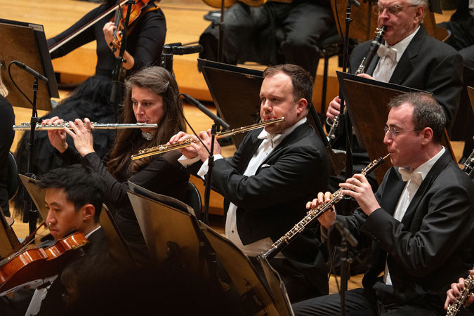 Group shot of CSO flutes and oboe on stage