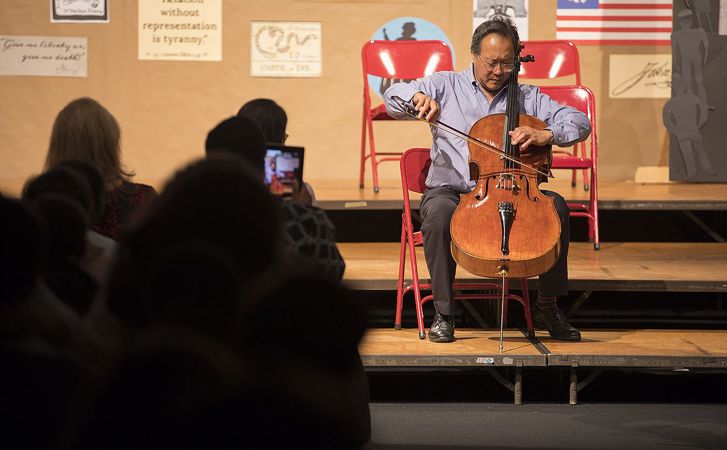 In his culminating project, Yo-Yo Ma performs at Disney Magnet School.