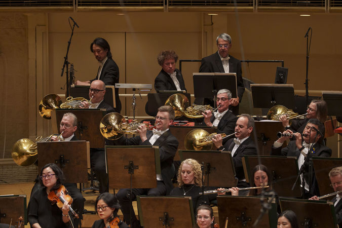 the horn section goes "bells up" during the performance, producing a wide and powerful sound