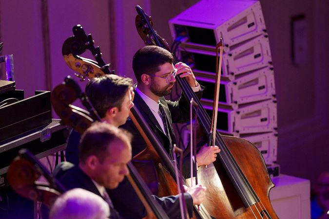 Group action shot of the CSO bass section