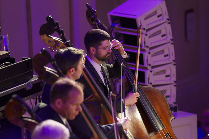 Group action shot of the CSO bass section